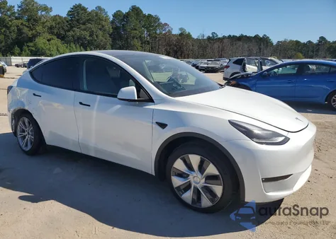 2023 Tesla Model Y from USA, damaged, VIN 7SAYGAEE7PF877589